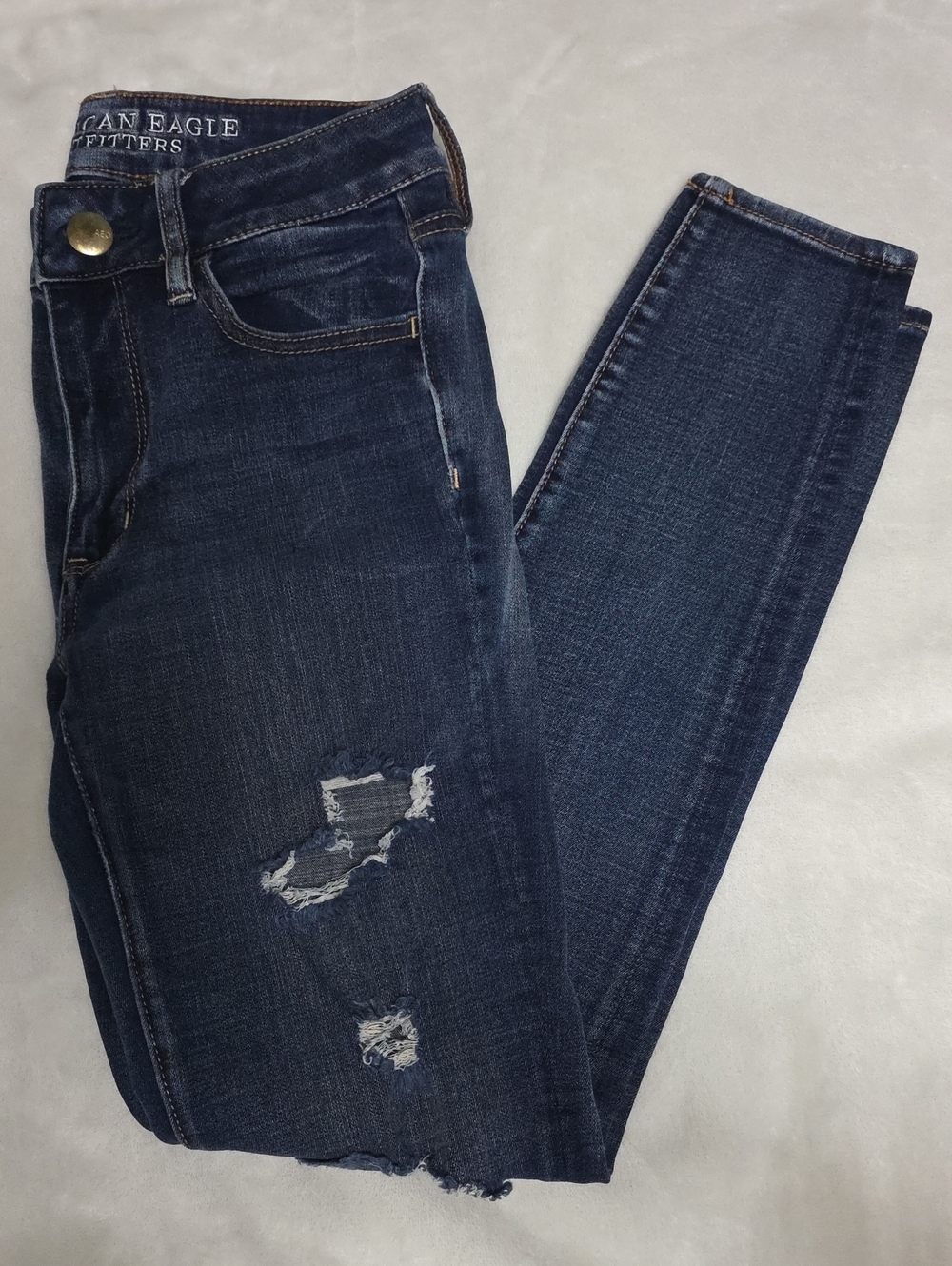 American Eagle Outfitters Navy Blue Distressed High Rise Jegging